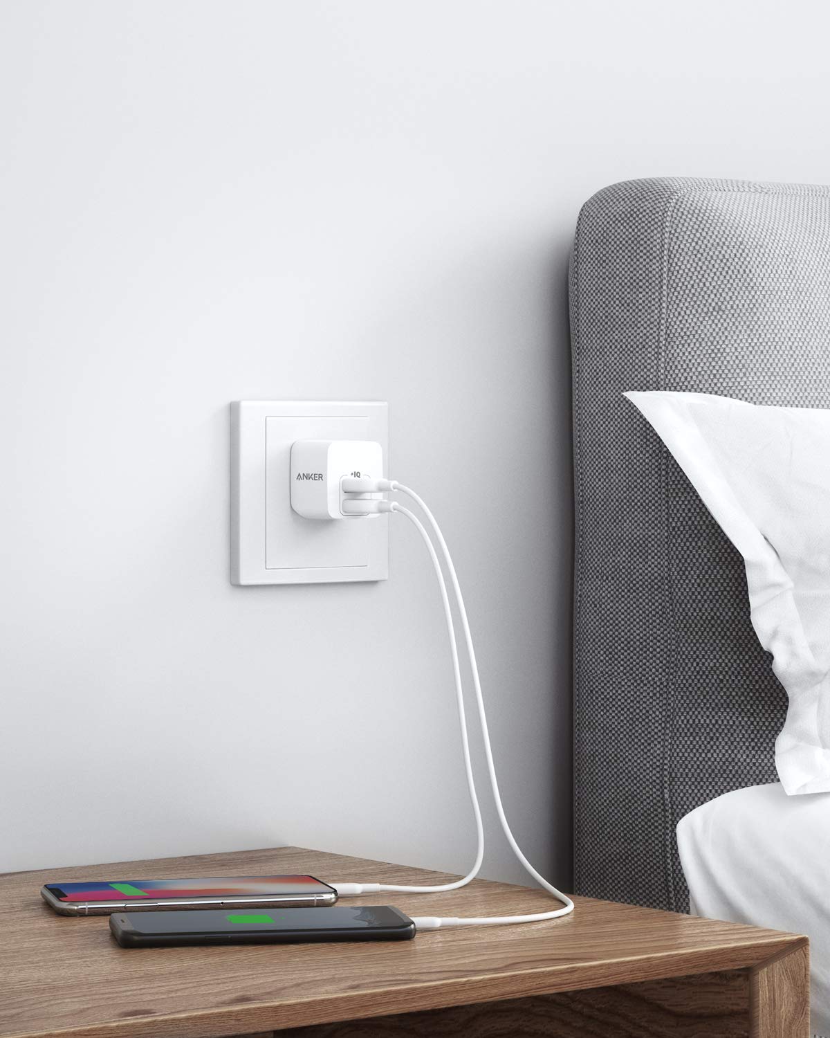 Anker charger with two smartphones for charging