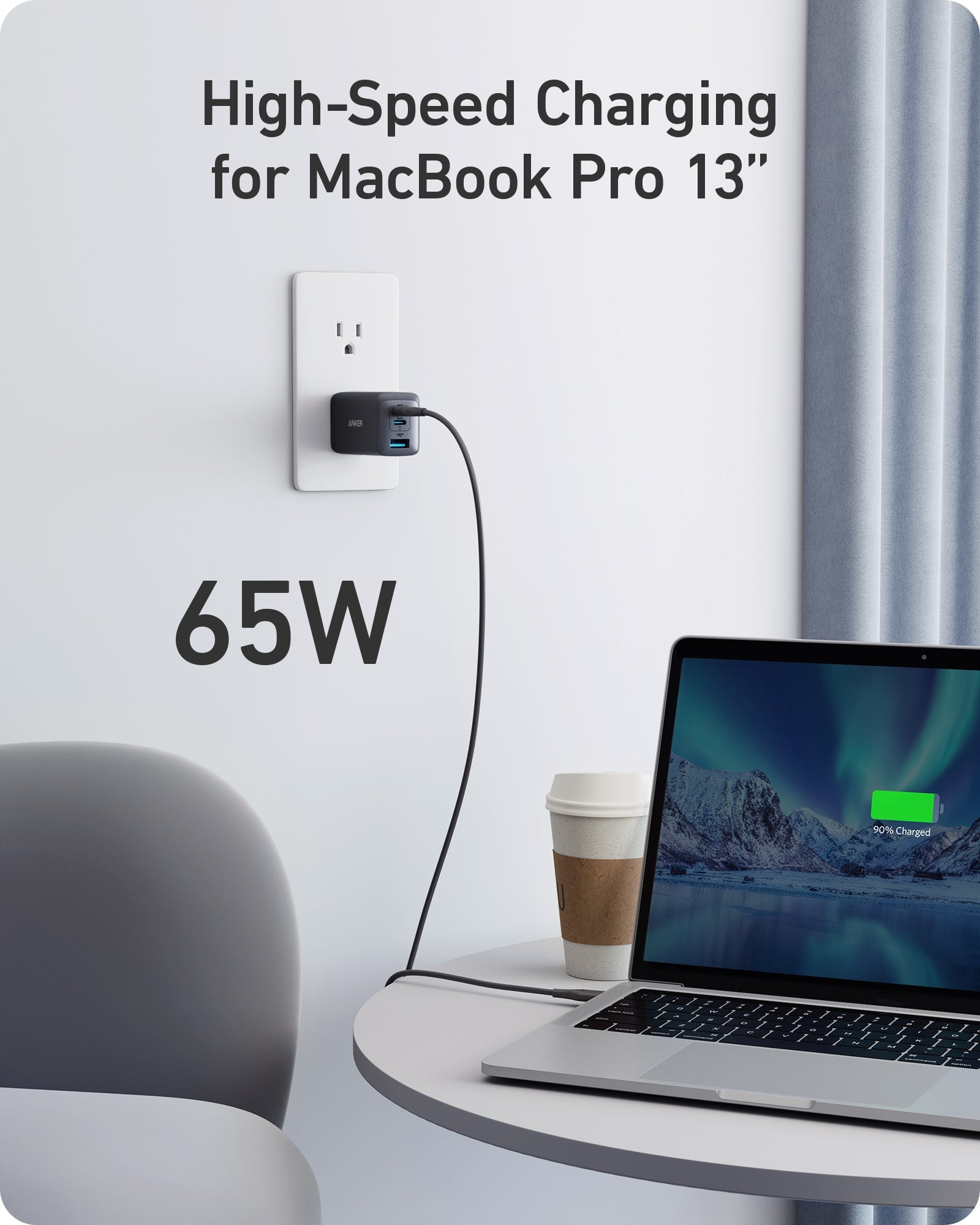 Anker charger powering MacBook Pro for fast 65W charging